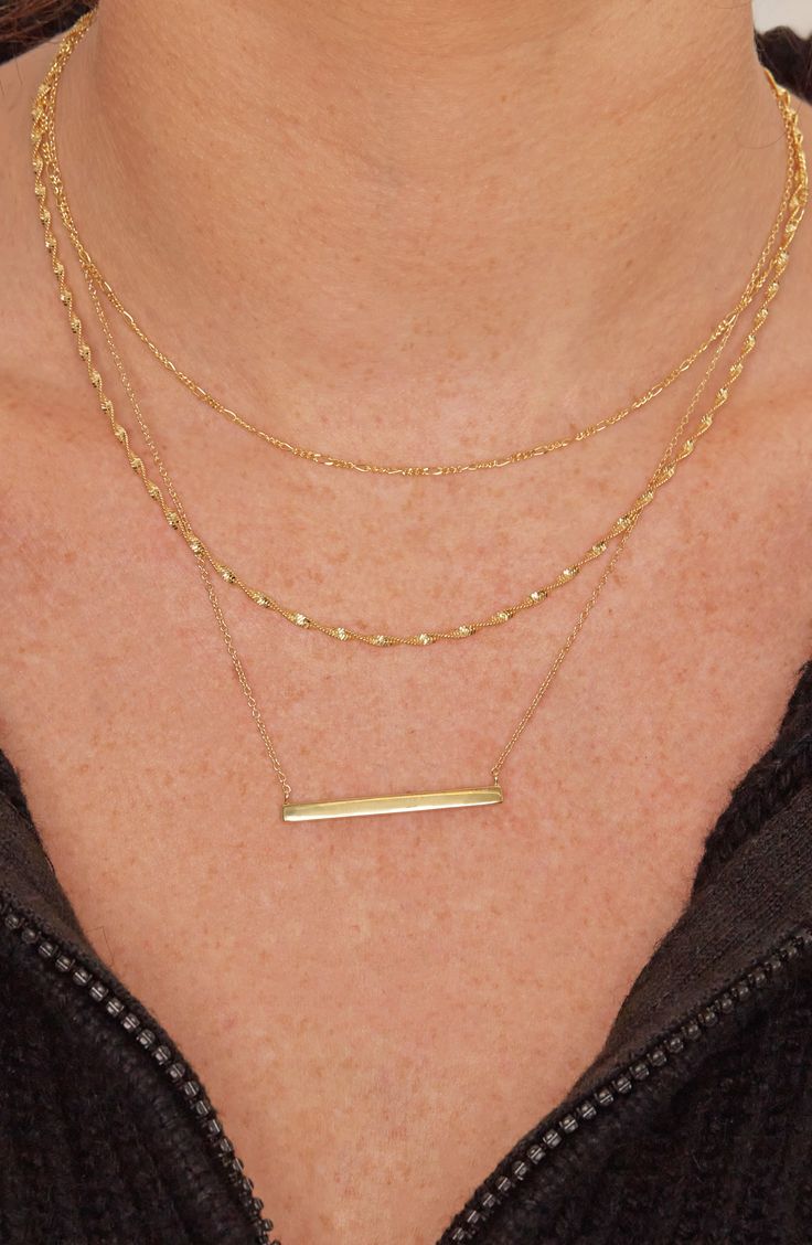 Minimalist in style but high on shine, this sleek bar-pendant necklace in your choice of sterling silver or gold plate is wonderfully versatile. 16" length; 2" extender; 1 1/2" pendant width Lobster clasp closure Sterling silver or sterling silver with 18k-gold plate Imported Minimalist Layering Bar Necklace, Elegant Bar Necklace With Cable Chain, Minimalist Bar Necklace With Delicate Chain For Layering, Elegant Bar Necklace With Adjustable Chain For Everyday, Elegant Everyday Bar Necklace With Cable Chain, Modern Bar Necklace For Everyday Wear, Elegant Everyday Bar Necklace With Adjustable Chain, Modern Bar Necklace With Adjustable Chain, Modern Everyday Bar Necklace With Adjustable Chain