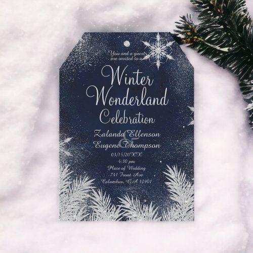 the winter wonderland celebration is on display in front of snow covered evergreen branches and pine cones