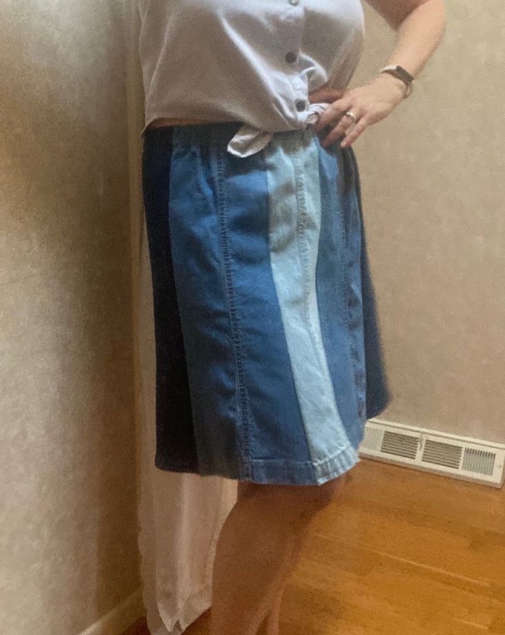 This is a one of a kind homemade denim blue jean leg panel skirt. I used the bottoms from 3 pairs of cotton jeans in different washes, light, medium and dark, reworking them and upcycling them making an eight section paneled skirt in 3 tones.  I washed the jeans in fragrance free soap before working with them. I cut eight panels from the legs, flaring them out slightly at the hem. I kept the jean hems intact for their style and character. The seams are done with a serger so they won't unravel. The waistband is elastic.  This is a medium to large fit skirt, depending on where you wear it on your waist. The unstretched length of the waist is about 16.5  inches across (33 doubled). The hip measurement is about 23" wide. (46) Length is about 20". If you'd like a similar but larger or smaller s Medium Wash Cotton Skirt With Patchwork, Denim Blue Patchwork Denim Skirt, Cotton Skirt With Patchwork In Medium Wash, Dark Wash Cotton Patchwork Skirt, Dark Wash Patchwork Cotton Skirt, Cotton Patchwork Skirt In Dark Wash, Blue Recycled Denim Skirt For Spring, Spring Blue Recycled Denim Skirt, Casual Reworked Skirt For Summer