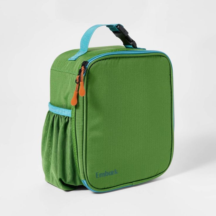 Bring your lunch or snack with you no matter where your adventures take you with this Flip-Down Square Lunch Bag from Embark™. Made from recycled polyester in green, this square lunch bag features a zippered main compartment plus an interior mesh pocket and an exterior water bottle pocket. Great for helping you keep food fresh for longer, it also has a top handle with a buckle closure that allows you to easily attach it to your backpack or hiking pack. Embark™: Find wonder as you wander. Rectangular Nylon Lunch Bag For Daily Use, Functional Rectangular Lunch Bag For Travel, Practical Green Rectangular Lunch Bag, Practical Green Lunch Bag For Everyday Use, Green Rectangular Lunch Bag For Everyday Use, Functional Rectangular Lunch Bag For Back To School, Functional Rectangular Lunch Box For Travel, Nylon Lunch Bag With Zipper For Travel, Travel Nylon Lunch Bag With Zipper Closure