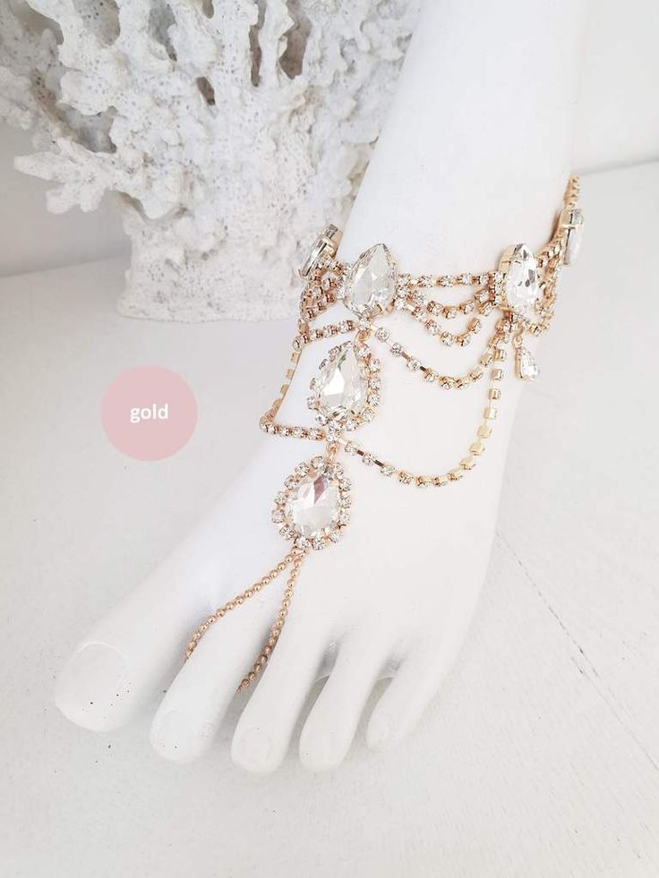 Elegant Crystal Sandals For Wedding, Elegant Crystal Wedding Sandals, Summer Wedding Jewelry With Rhinestones, Gold Sparkling Sandals For Wedding, Sparkling Gold Sandals For Wedding, Elegant Barefoot Sandals For Party, Glamorous Summer Wedding Jewelry, Glamorous Wedding Sandals With Adjustable Fit, Glamorous Adjustable Wedding Sandals