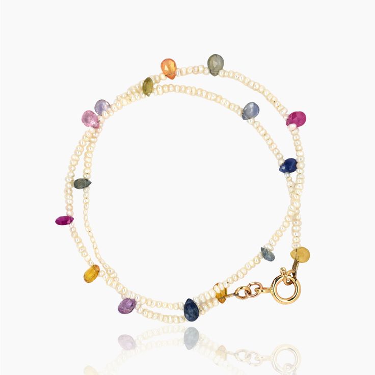 Gold, Pearl & Stone Bracelet - This double wrap bracelet showcases multi-colored faceted sapphires interspersed with white freshwater seed pearls, all secured with a 14k gold-filled spring ring closure. This delicate piece is sure to become a staple in your jewelry collection!<br><br>Available in 3 sizes. Double Wrap Bracelet, Pearl Stone, Artful Home, Bracelet Diy, Seed Pearl, Gold Pearl, Stone Bracelet, Diy Bracelets, Spring Rings