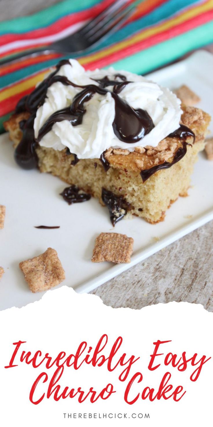 there is a piece of cake on the plate with chocolate sauce and marshmallows