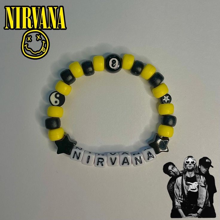 a yellow and black beaded bracelet with the words nirvana on it