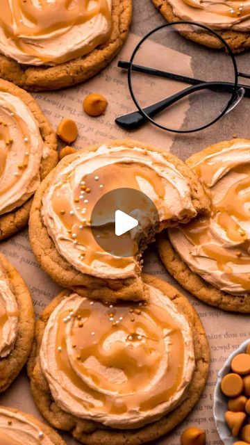 cookies with peanut butter frosting and glasses on top