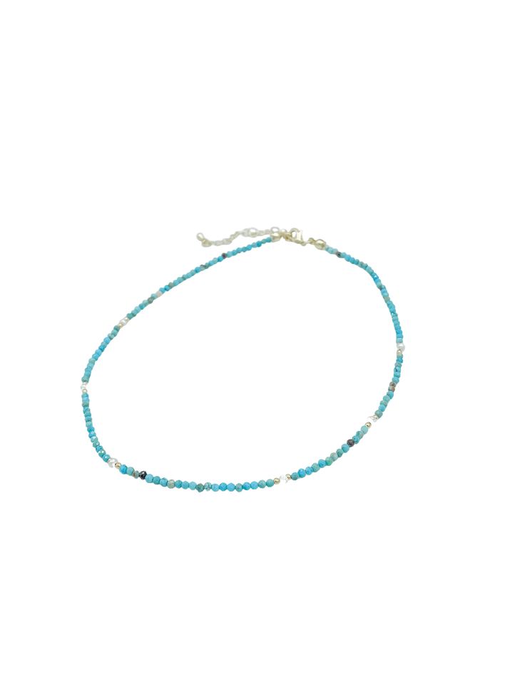 Details: Choker Necklace Small Beads Available in Turquoise or Pearls Extension Approximate Dimensions: Length: 13.5" Extension: 2" Beads: 2mm - 3mm Pearls: 3mm Elegant Beaded Turquoise Necklace For Beach, Adjustable Turquoise Necklace For Gift, Adjustable Turquoise Necklace As A Gift, Adjustable Light Blue Turquoise Necklace Gift, Adjustable Single Strand Turquoise Beaded Necklace, Adjustable Turquoise Single Strand Beaded Necklace, Elegant Adjustable Beaded Turquoise Necklace, Turquoise Dainty Beaded Necklace, Elegant Adjustable Turquoise Necklace With Faceted Beads