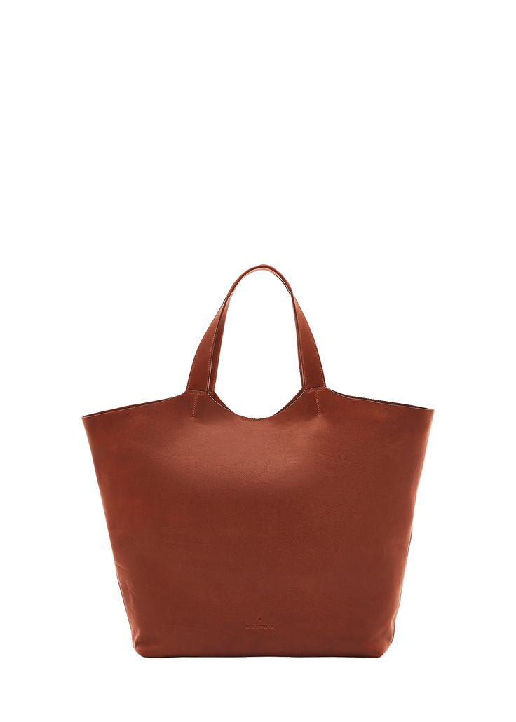 "Find IL BISONTE Le Laudi Leather Tote Bag on Editorialist. Il Bisonte \"Le Laudi\" shoulder bag in vachetta leather Flat shoulder straps, 7.5\" drop/ 16.2\"L Open top with magnetic closure Interior, one slip pocket Lining: Suede Approx. 15.4\"H x 20.5\"W x 3.1\"D Item Weight (Lbs.): 2.0 Made in Italy" Dark Tan Leather Bag For On-the-go, Cognac Textured Leather Bag For On-the-go, Brown Calf Leather Bag With Double Handle, Cognac Calf Leather Tote Bag, Brown Calf Leather Tote Shoulder Bag, Elegant Cognac Bucket Bag For On-the-go, Daily Use Cognac Shoulder Bag With Textured Leather, Cognac Calf Leather Shoulder Bag With Double Handle, Cognac Textured Leather Top Handle Bag