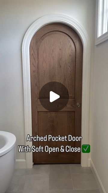 an arched pocket door with soft open and close text overlay reads arched pocket door