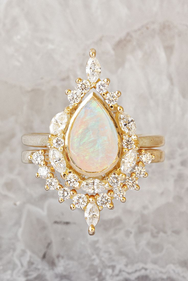 Opal Engagement Ring Set - pear shape Audtralian fire Opal & diamonds vintage inspired bridal ring set, available in 14K or 18K gold . Handmade & designed by Silly Shiny Diamonds Teardrop Wedding Diamond Ring With Rose Cut Diamonds, Wedding Teardrop Diamond Ring With Rose Cut Diamonds, Heirloom Style Stackable Rings With Diamond Accents, Fine Jewelry Wedding Diamond Ring With Rose Cut Diamonds, Teardrop Rose Cut Diamond Fine Jewelry For Weddings, Heirloom 14k Gold Cluster Ring For Wedding, Heirloom Style Cluster Ring With Halo, Pear-shaped Rose Cut Diamond Wedding Ring, Vintage Halo Diamond Wedding Ring