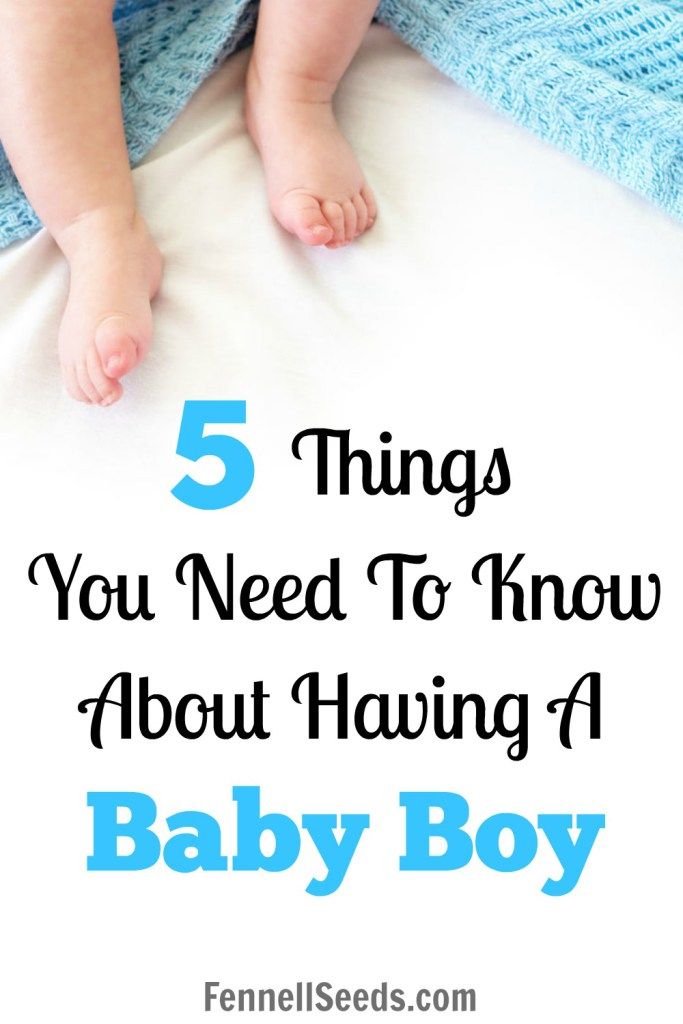 a baby laying on top of a bed with the words 5 things you need to know about having a baby boy