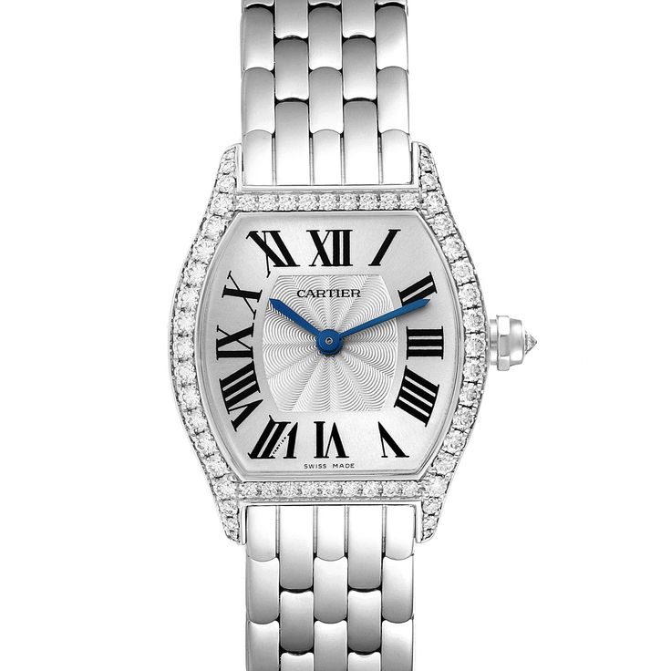 Cartier Tortue White Gold Diamond Ladies Watch WA501011. Manual winding movement. 18K white gold case 24.0 x 30.0 mm. Octagonal crown set with the diamond. Diamond lugs. 18K white gold bezel with factory Cartier diamonds. Scratch resistant sapphire crystal. Silver dial with Roman numerals. Blue sword shape hands. Secret signature at VII. 18k white gold bracelet with double deployant hidden clasp. Fits 6 1/4" wrist. Cartier Diamond Watch With Round Dial, Cartier Diamond Watch With Diamond Accents, Formal Diamond White Watch With Metal Dial, Cartier Diamond Watch With Diamond Hour Markers For Anniversary, Classic Diamond White Watch With Metal Dial, Diamond Wedding Watch With Subdials, Wedding Diamond Watch With Subdials, Classic Silver Diamond Watch With Diamond Hour Markers, Timeless Cartier Diamond Watch In Platinum