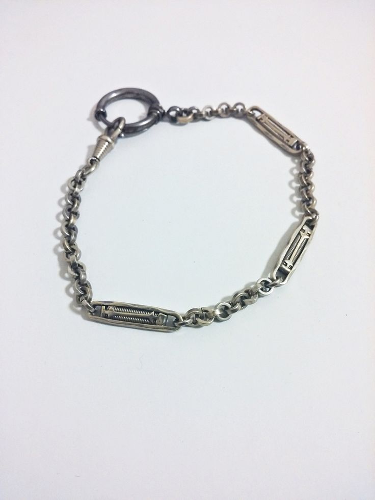 Up for sale is a German art deco watch chain in silver-toned metal, appears to be chromed. The clasp is stubborn and occasionally when trying to close it, the tongue slips outside the hole. Otherwise, in good antique condition. Bracelet Thick, Art Deco Watch, German Art, Plastic Jewelry, Watch Chain, Pocket Watches, Antique Metal, Scottsdale Az, Pure Silver