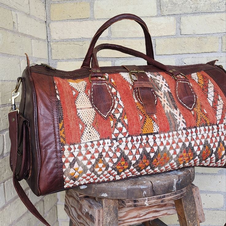 Turn Heads At The Airport Or On Your Next Weekend Getaway! This Handmade Leather & Kilim Duffel Bag Is Stunning And Functional! Never Used, But Has A Worn In Bohemian Vibe To It... Zippered Top Closure W/Buckle, Side Patch Pockets With Buckles, Removable Carry Strap... No Interior Pockets... I Believe This Was Made In Morocco Dimensions - 191210 Inches Kilim Bag, At The Airport, Zipper Top, Weekend Getaway, Duffel Bag, Handmade Leather, Leather Handmade, Travel Bags, Patch Pocket