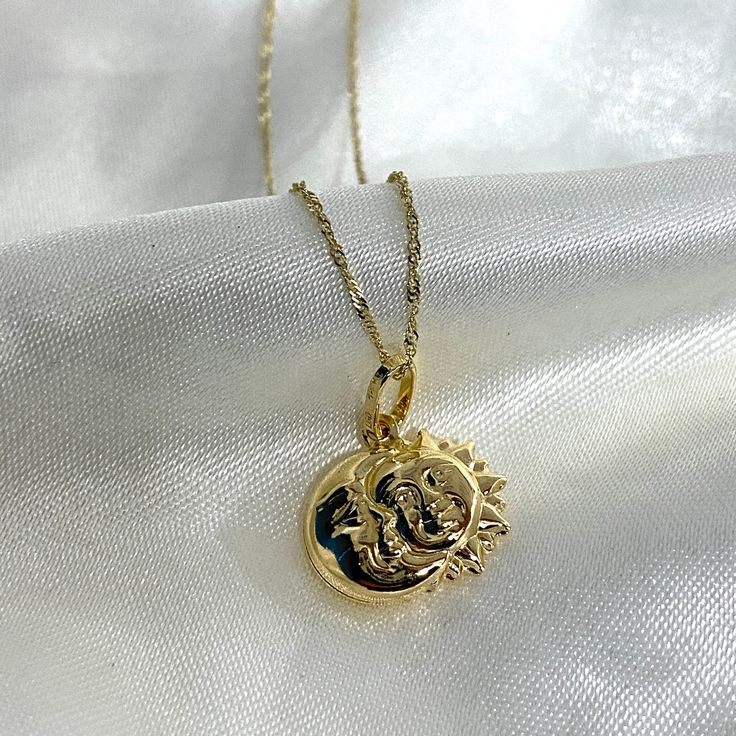 14K Gold Sun & Moon Charm Pendant With 0.9MM Singapore Chain Necklace Real Gold  Necklace Charm Celestial Solid Gold Necklace ✅ PENDANT SPECIFICATIONS:  * Height: 0.51 in. (13 MM) * Width: 0.59 in. (15 MM) * Average Weight: 1.32 gr. ✅ CHAIN SPECIFICATIONS:  * Clasp: Spring-Ring  * Width: 0.9 MM ➤ Length: 16 inches   Avg Weight: 0.64 ➤ Length: 18 inches   Avg Weight: 0.71 ➤ Length: 20 inches   Avg Weight: 0.76 ➤ Length: 22 inches   Avg Weight: 0.83 ✅SHIPPING CONTENTS: -14K Gold Pendant & Chain -J Yellow Gold Jewelry With Moon Phase, Celestial Crescent Charm Necklaces, Celestial Half Moon Gold Jewelry, Gold Plated Moon Phase Jewelry, Moon Phase Round Charm Necklace, Moon Phase Charm Necklace, Celestial Yellow Gold Charm Necklaces With Moon Phase, Celestial Yellow Gold Charm Necklace With Adjustable Chain, Silver Moon Phase Necklace In Gold Plated