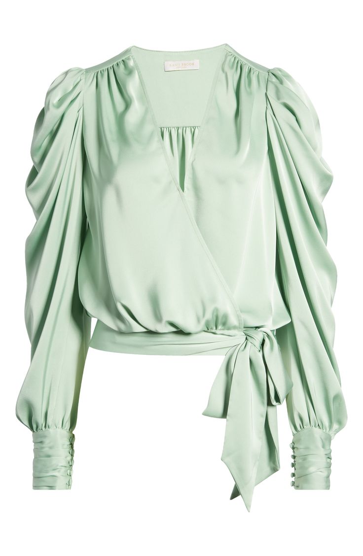 A serene shade and a lustrous fabric softly animate this graceful blouse styled with the season's abundant sleeves. 20" length (size medium) 100% polyester Dry clean Imported Elegant Long Sleeve Blouse With Draped Sleeves, Elegant Long Sleeve Tops With Draped Sleeves, Formal Long Sleeve Blouse With Draped Sleeves, Formal Blouse With Draped Long Sleeves, Formal Fall Tops With Draped Sleeves, Formal Tops With Draped Sleeves For Fall, Party Tops With Draped Long Sleeves, Formal Blouse With Draped Sleeves For Spring, Fitted Silk Blouse With Draped Sleeves