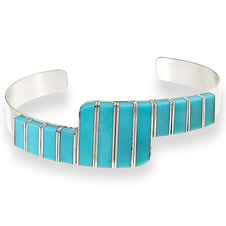 Jay King Sterling Silver Campitos Turquoise Cuff Bracelet  A chic, contemporary design and beautiful blue Campitos turquoise inlay makes this handcrafted sterling silver cuff bracelet a fun, fashionable addition to any accessories collection! From Jay King.       Approx. 6-3/4"L x 3/4"W; fits 6" to 7" wrist     Stamped .925     Sterling silver, contemporary-style cuff bracelet has turquoise rectangles inlaid vertically across top   Stone Information       All sizes and weights approximate     Stabilized Campitos Turquoise - Freeform (4x10mm to 4x20mm); mined in Mexico Turquoise Sterling Silver Cuff Bracelet With Polished Finish, Sterling Silver Turquoise Cuff Bracelet With Inlay, Turquoise Sterling Silver Cuff Bracelet With Inlay, Modern Turquoise Cuff Bangle Bracelet, Modern Turquoise Cuff Bangle, Turquoise Cuff Bracelet With Polished Finish, Adjustable Turquoise Modern Cuff Bracelet, Adjustable Turquoise Cuff Bracelet Modern Style, Modern Turquoise Sterling Silver Jewelry