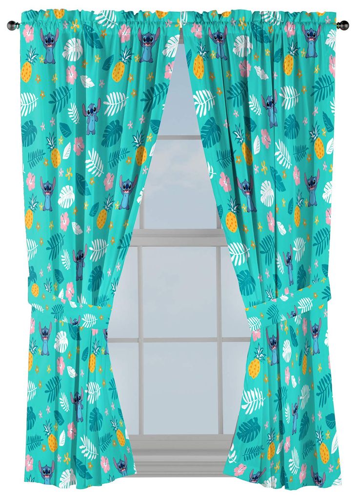 a window with blue curtains and flowers on it