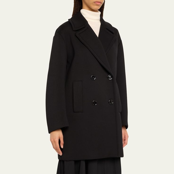 Max Mara "Gradi" top coat in a cotton blend  Notched lapel collar  Two-row button front  Long sleeves Side slip pockets  Mid-length  Relaxed fit  Cotton/viscose Imported