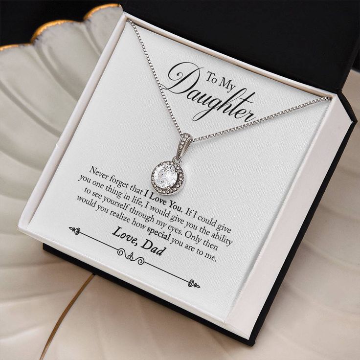 a necklace in a gift box that says to my daughter