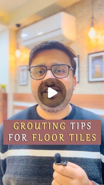 a man holding a cell phone in front of his face with the words grouping tips for floor tiles