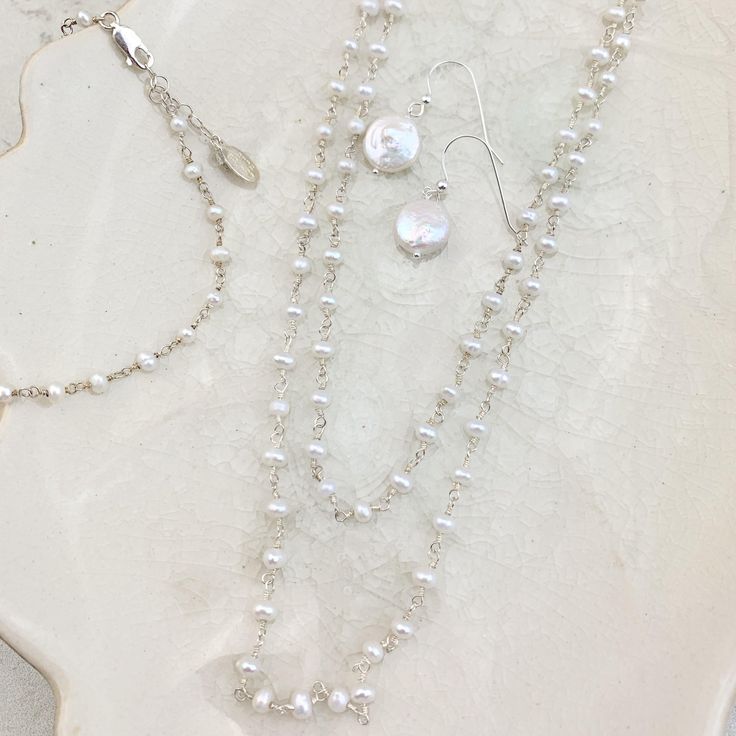 These elegant earrings are sure to make any bride look absolutely stunning. This classic pair is perfect for my pearl loving women! The earrings could work with either the bride, bridesmaids, or mother of the bride/groom styles. Give yourself or your loved one a piece that will be an everlasting memory of this new chapter in life. Length: 1" Coin Pearl Earrings, Wearing Pearls, Rosary Jewelry, Pearl Rosary, Rosary Bracelet, Coin Pearls, Bride Look, Elegant Earrings, Classic Elegance