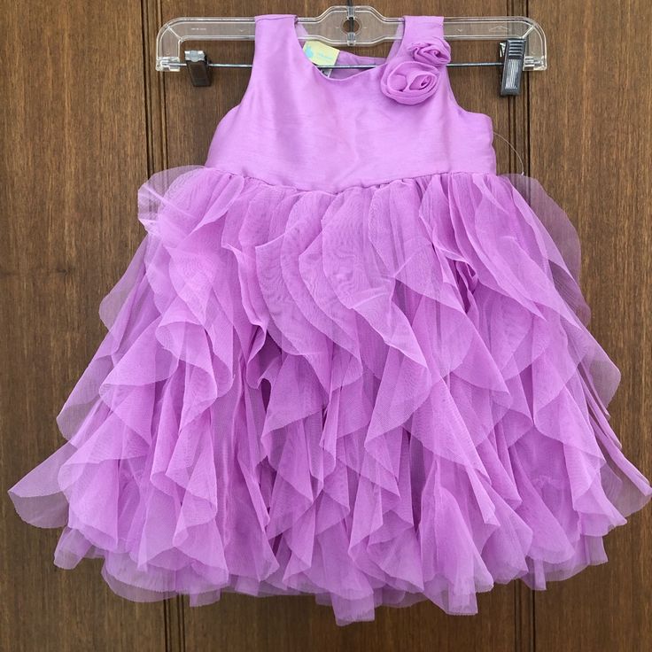 Nwot Lilac Dress With Cascading Tulle Layers In Size 18 Months. Two Rosettes At Front. Button Back Closure. Perfect For A Special Occasion. Brand New. Purple Ruffled Princess Dress For Dress-up, Purple Sleeveless Dress For Dress-up, Spring Princess Dress With Ruffles In Purple, Purple Princess Dress With Ruffles For Spring, Purple Princess Dress For Spring Dress-up, Purple Princess Dress For Dress-up In Spring, Purple Sleeveless Ruffled Tutu Dress, Sleeveless Ruffled Tutu Dress For Playtime, Purple Princess Dress For Dress-up