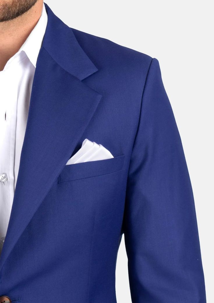 A distinct and striking look, the Ellis Royal Blue Twill suit is custom made for those who want to make a statement. The vibrant color features a subtle hint of purple for a bold look. Exude confidence in royal blue. Classic Purple Tuxedo For Semi-formal Events, Royal Blue Long Sleeve Suit For Wedding, Elegant Blue Double Breasted Suit For Semi-formal Occasions, Classic Royal Blue Tuxedo With Notch Lapel, Classic Royal Blue Tailored Tuxedo, Classic Three-piece Suit In Royal Blue With Notch Lapel, Royal Blue Notch Lapel Blazer For Formal Occasions, Classic Three-piece Suit With Notch Lapel In Royal Blue, Formal Royal Blue Notch Lapel Blazer