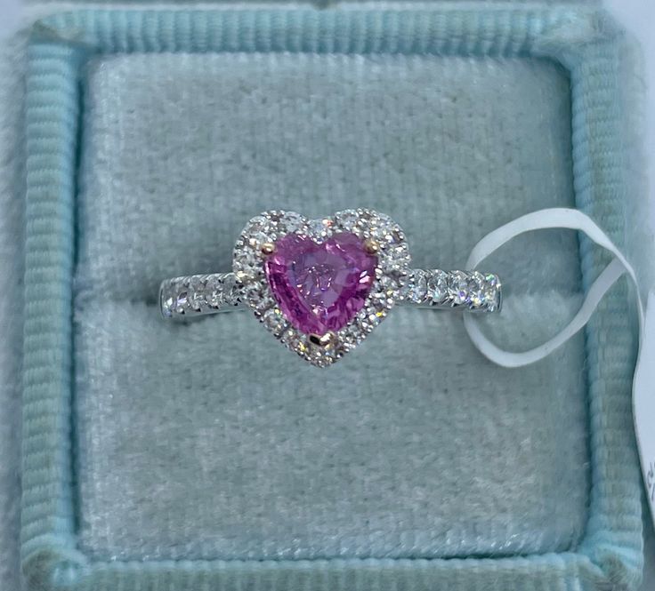 Beautiful Heart Shape Pink Sapphire and Diamond Ring White Gold. The heart shape pink sapphire is a beautiful pink color and is full of life. The diamonds are very sparkling. Excellent craftsmanship, all stones are set nice and smooth. The heart measures 8x9mm. Small dainty heart ring for your sweetheart. Genuine heart shape pink sapphire 0.72 carats Eye clean stone Genuine round brilliant cut diamonds Total weight: 0.41 Carats Clarity: SI Color: F All shiny diamonds, no cloudy or yellowish ston Pink Sapphire Heart Ring, Gia Certified Heart Shaped Fine Jewelry Ring, Gia Certified Heart Cut Diamond Ring, Gia Certified Heart Diamond Rings, Pink Diamond Sapphire Ring, Gia Certified, Heart-shaped Gia Certified Ring For Anniversary, Gia Certified Heart Shaped Anniversary Ring, Gia Certified Heart-shaped Ring For Anniversary, Pink Heart-shaped Diamond Promise Ring