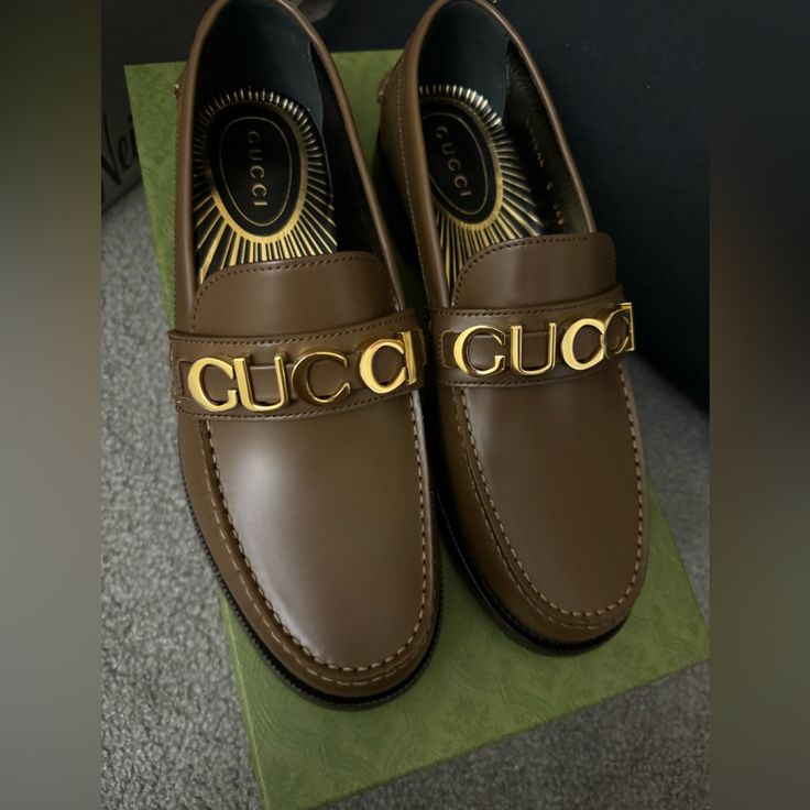 Brand New Men Gucci Loafers. Luxury Tassel Loafers With Brogue Detailing, Gucci Calf Leather Loafers With Rubber Sole, Luxury Wingtip Loafers, Gucci Loafers In Calf Leather, Gucci Calf Leather Loafers With Branded Insole, Gucci Calf Leather Loafers, Classic Gucci Dress Shoes In Calf Leather, Designer Business Loafers With Rubber Sole, Designer Tassel Loafers With Leather Sole