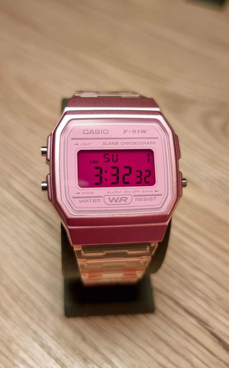 F-91W "Miami Pink" - Modified Pink Transparent Casio Watch with Inverted Pink Back Screen Mod This model was made with 80's in mind. If you ever needed a watch even if you were on vacation, not to check what time it is, but just of curiosity because you want to see the sunset tomorrow at the same time, we think that this is the perfect companion for doing so. So yeah, if you are ready to feel like you were born in 80's Miami, this is the Casio to get. Watch is modified in-house by EON workshop. Cool Gifts For Women Teepublic, Dainty Watch Digital, Casual Multicolor Cheap Watches, Luxury Pink Chronograph Watch, Luxury Retro Chronograph Watch Accessories, Cheap Casual Analog Watches, Affordable Casual Watches As Gifts, Cheap Women's Analog Watches, Cheap Durable Watches