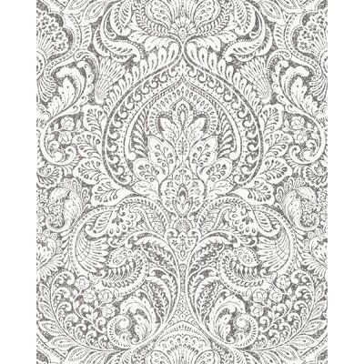 an old wallpaper pattern in grey and white