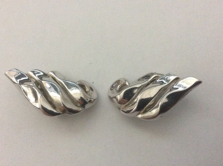 "Trifari silver plated wave clip-on earrings. Excellent vintage condition. 1960-s. size - 1.25\" x 0.75\"" Silver Metal Clip-on Earrings For Formal Occasions, Formal Silver Metal Clip-on Earrings, Retro Silver Metal Clip-on Earrings, Silver Retro Metal Clip-on Earrings, Retro Silver Earrings For Formal Occasions, Silver Retro Earrings For Formal Occasions, Jun 2023, Clip On Earrings, Silver Plate