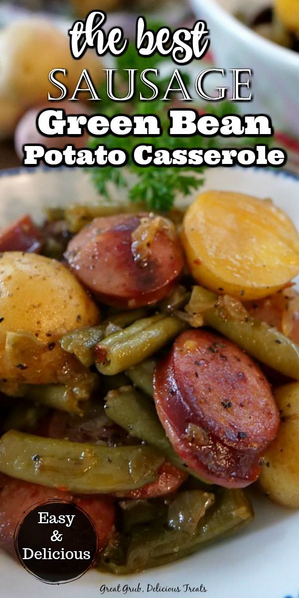 sausage, green bean and potato casserole on a white plate