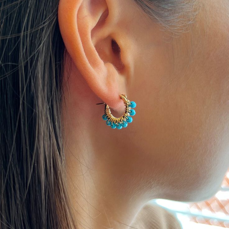 Hoop Earrings with Turquoise It is hand-crafted by me to order in Los Angeles  Thank you for shopping U & Mi :)  ✶MEASUREMENTS✶ -Earrings  0.7 inch  ✶MATERIALS✶ -14k gold filled findings  -Turquoise ✶GIVING AS A GIFT?✶ Jewelry will be packaged in a box and mailed in bubble mailer. If you would like to pick special label, please let me know! I offer three options:  1. Happy Birthday 2. Love 3. Best Friend ✶PROCESSING TIME✶ -Current processing time is 1-3 days. -Processing time is separate from shipping time. ✶SHIPPING✶ Free Shipping within the United States  General shipping time guidelines for USPS services -USPS First Class Package Services: 2-5 days -USPS Priority Mail: 1-3 days -USPS Priority Mail Express: 1-2 days ✶INTERNATIONAL SHIPPING✶ -May take 1 - 5weeks for your package to be del Turquoise Hoop Earrings With Natural Stones As Gift, Turquoise Hoop Earrings As A Gift, Turquoise Hoop Earrings For Gift, Handmade Turquoise Hoop Earrings As Gift, Turquoise Natural Stone Hoop Earrings As Gift, Handmade Blue Huggie Hoop Earrings, Handmade Blue Huggie Earrings, Turquoise Hypoallergenic Hoop Earrings As Gift, Hypoallergenic Turquoise Hoop Earrings As Gift