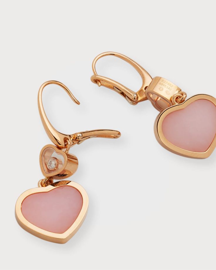 Chopard earrings from the My Happy Hearts collection    18karat rose gold with a polished finish    Two seethrough windows with freefloating diamonds    Heartshaped pink opal as dangles    Diamond total carat weight: 0.10    Leverback closure    For pierced ears    Made in Germany    Care Instructions: Wash with a nonchemical liquid soap. Rinse piece under water, avoiding any stones. Chopard Happy Hearts, Chopard Earrings, Chopard Jewelry, Dancing Diamond, Rose Gold Pink, Heart Shaped Diamond, Happy Heart, Liquid Soap, Pink Opal