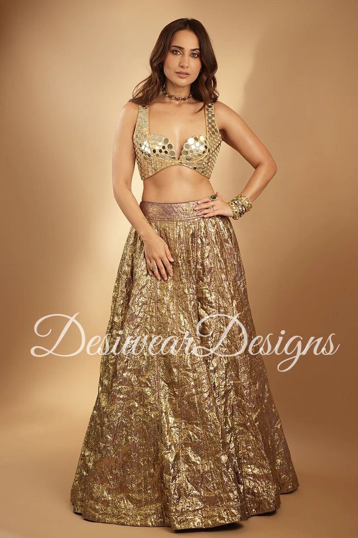 Made to Order/Measurement/Custom Order Lehenga - Color :  Gold - Fabric : crush tissue - Fully flared paneled lehenga - Embroidered  Blouse -  Net Dupatta with Gold Border - Drawstring closure with Tassels - - It can be customize in any design or size  PLEASE NOTE: BUYERS ARE RESPONSIBLE FOR ANY CUSTOMS AND IMPORT TAXES THAT MAY APPLY. This is a made to order product. If you opt for 'Made To Measurement Option', we will provide a measurement template and you can share the measurements likewise. If you want to opt for 'Standard Size', Please refer to the size chart provided in the listing. Shipping: Standard Shipping is done by DHL ecommerce and it mostly takes 2 to 3 weeks to deliver after dispatch. Express Shipping is done by DHL express and it mostly delivers within a week after dispatch Crush Tissue Lehenga, Glamorous Wedding Pre-draped Saree With Pallu, Glamorous Tissue Silk Sets With Zari Work, Glamorous Tissue Silk Choli For Festive Occasions, Glamorous Festive Tissue Silk Choli, Glamorous Tissue Silk Lehenga With Zari Work, Fitted Pre-draped Saree With Zari Work For Wedding, Fitted Bollywood Style Pre-draped Saree For Festive Occasions, Diwali Party Pre-draped Tissue Silk Saree