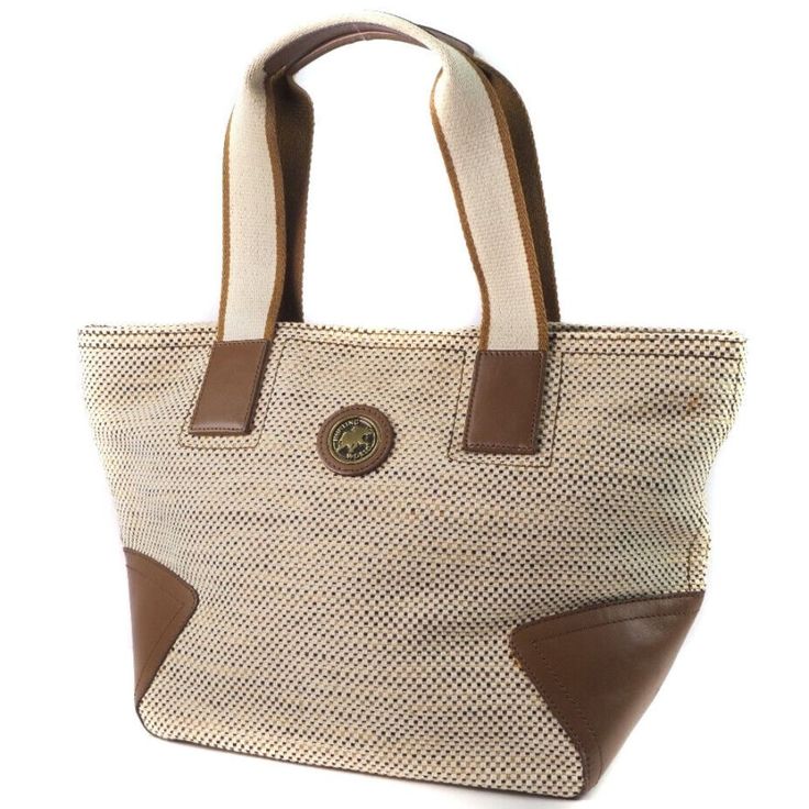 Store Item No. 57200453 Brand Hunting World Material Canvas/Leather Color Beige Size(Cm) H:26cm X W:40cm X D:16cm Handle Height18cm Size(Inch) H:10.2 X W:15.7 X D:6.3inch Weight 545g Country Of Manufacture America Specification Closing Ceremonymagnet Type Inside Open Pocket X 1 Diagonal Or Shouldershoulder Accessories None Condition Rank B Exteriorfine Scratchaging Condition Rank N New Brand New With Tags. S New / Unused New Item, But May Have Insignificant Scratches Or Slight Discoloration Due Rectangular Tan Bag With Leather Trim, Tan Rectangular Bags With Leather Trim, Tan Rectangular Bag With Leather Trim, Luxury Beige Coated Canvas Shoulder Bag, Luxury Beige Bag For Everyday Use, Luxury Beige Bags For Everyday Use, Classic Natural Bags With Braided Handles, Luxury Beige Tote Shoulder Bag, Classic Natural Bag With Braided Handles