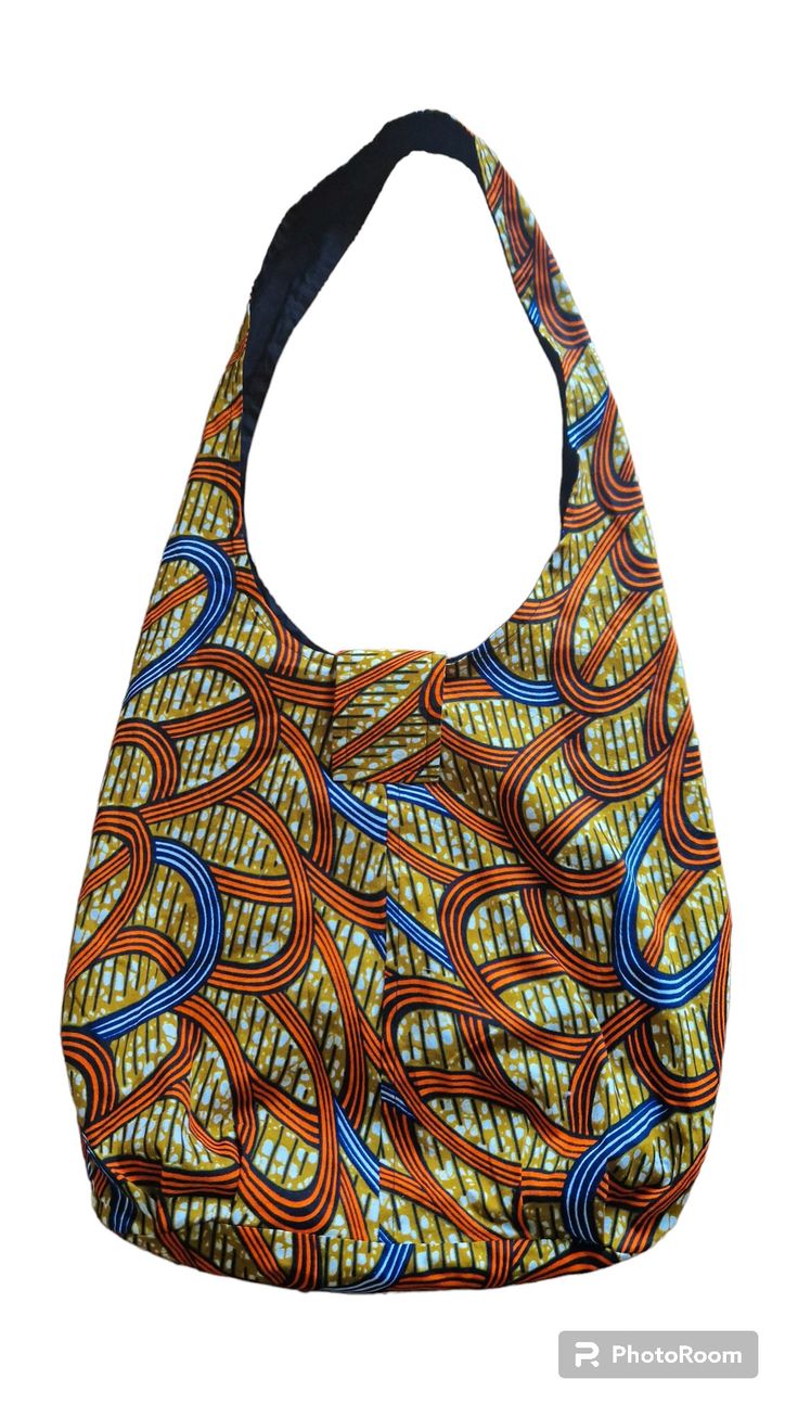 Hobo Bag - Blue or Orange African Print Bag *HOW I CREATED THIS BAG: Our aim is to bring you eco-friendly shopping bags that can be used again and again. This bag is made with genuine African Print 100% cotton fabric. The bag is expertly sewn together making this bag strong and sturdy.  This tote bag is lightweight but also sturdy enough to carry books or shopping.  When the bag is not in use it can be easily rolled up  Features: *Made of 100% African Print cotton *Sustainable, renewable and bio Reusable Shoulder Bag For Shopping, Blue Shoulder Bucket Bag As Gift, Blue Shoulder Bucket Bag As A Gift, Blue Shoulder Bucket Bag For Gift, Versatile Rectangular Reusable Bag, Versatile Rectangular Reusable Bags, Blue Bucket Bag For Market, Blue Bucket Shoulder Bag For Market, Blue Bucket Bags For Market