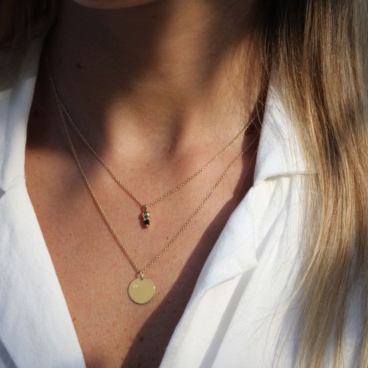 The Chiara necklace is a light gold round disc necklace that you just NEED. Wheather you wear it alone or stacked, with your another necklace or bare alone- it's perfect. Add a personal touch to your Chiara necklace with an engraved portrait of a loved one on one side and their name engraved on the opposite side. If you can dream it- we can make it happen. All features can be customized! Talk to us, we love making custom designs. Our jewelry is carefully handmade in our atelier To order by phone call +972(0)722991000 Layering Jewelry With Cable Chain, Elegant Sterling Silver Round Disc Coin Necklace, Gold Plated Necklace With Detachable Round Pendant, Dainty Round Cable Chain Necklaces, Dainty Necklace With Cable Chain, Yellow Gold Round Charm Necklaces For Layering, Everyday Yellow Gold Necklace With Coin Pendant, Necklace With Cable Chain And Round Pendant For Layering, Cable Chain Necklace With Round Pendant For Layering