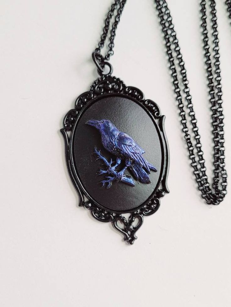 JUST LISTED Blue Iridescent Raven Crow Gothic Rockabilly Cameo Black Necklace Pendant Victorian Jewelry Hand painted cameo If you are wanting a specific color of roses please feel free to contact me and I will do my best to create what you are searching for. Victorian Jewelry substantial in size at just a little over 2 INCHES Long Center is 40mmx30mm **MATCHING ITEMS IN OUR STORE BADGE HOLDER BROOCH HAIR PINS - CLIPS** **thank you for taking the time to look at our items. Each item is handcrafte Color Of Roses, Gothic Rockabilly, Jewelry Hand, Cameo Necklace, Faux Pearl Necklace, Black Necklace, Victorian Jewelry, Gold Tone Necklace, Badge Holder