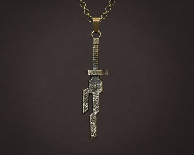 The pendant is oxidized and has battle-worn texture on it - making it look like it has gone through a lot and has several stories to tell. This necklace is a true symbol of power. * The size of the pendant is: 𝟔𝟎𝐦𝐦 𝐱 𝟏𝟏 𝐦𝐦 * Comes with 22 inches long chain * Cast from Brass or 925 Sterling Silver The brass version comes with an ancient bronze color chain. 925 Sterling Silver version comes with a stainless steel chain. Warrior Style Gold Necklaces As Gift, Brutalist Pendant Jewelry Gift, Hand Forged Gold Brutalist Jewelry, Brutalist Hand Forged Gold Jewelry, Handmade Gold Brutalist Jewelry, Handmade Brutalist Gold Jewelry, Brutalist Brass Jewelry In Bronze, Brutalist Bronze Brass Jewelry, Medieval Style Antique Finish Jewelry Gift