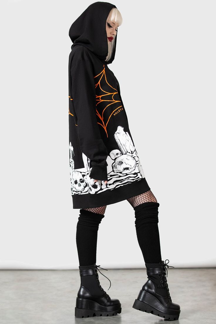 PUMPKIN.- Soft, light stretch cotton.- Statement, all-over, contrasting custom print.- XL hood with drawstring.- Long, cuffed sleeves.- Fitted.- Unisex, so it's for everyone.Model with blonde hair is 5ft 4 and wears a size L for an oversized look.Model with ear stretchers is 6ft 1 and wears a size L.with KILLSTAR branding, 100% Cotton. Urban Cotton Hoodie For Halloween, Alternative Long Sleeve Hoodie For Halloween, Halloween Urban Cotton Hoodie, Alternative Cotton Halloween Hoodie, Halloween Cotton Sweatshirt With Adjustable Hood, Black Halloween Hoodie With Drawstring, Halloween Graphic Print Hoodie With Relaxed Fit, Halloween Graphic Print Relaxed Fit Hoodie, Alternative Graphic Print Hoodie For Fall