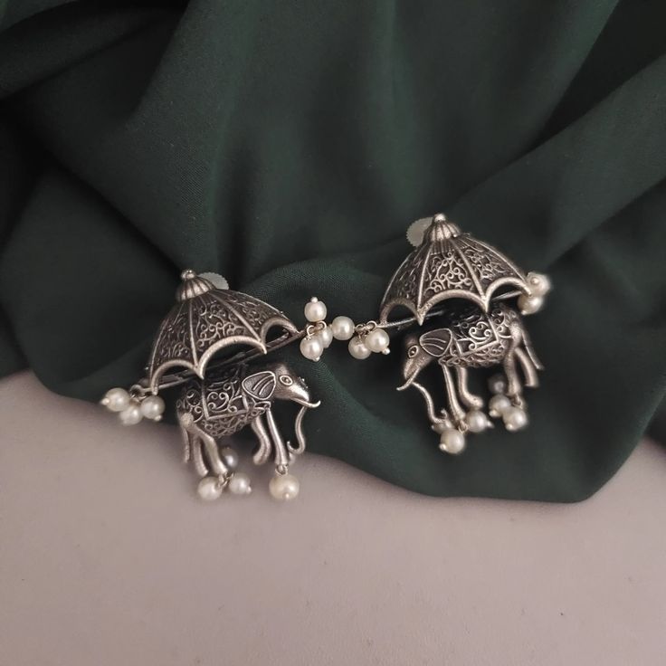 Discover Glamaya's Trendy & Stylish Unique Silver Elephant Stud Earring for Women at just ₹449.00! 🛍️ We have amazing offers going on 1. Buy any 2 products below ₹1000 and get 1 absolutely FREE 🤩 2. Buy 3 items in ₹999 3. Up to 85% + Extra 15% Off Storewide by using code "SUMMERSALE15" 🎉 ✅Latest & Trending Designs ✅100k+ Happy Customers ✅ Free shipping across India. ✅ COD Available | Easy Returns Limited Stock Available! Shop Now on glamaya.com ⏰ #glamaya #freeshipping #necklaces #jewelr... Silver Jhumka Earrings, Trendy Silver Jewelry, Elephant Earrings Studs, Trendy Stud Earrings, Antique Jewellery Designs, Silver Elephant, Indian Jewellery Design Earrings, Traditional Earrings, Indian Jewelry Sets