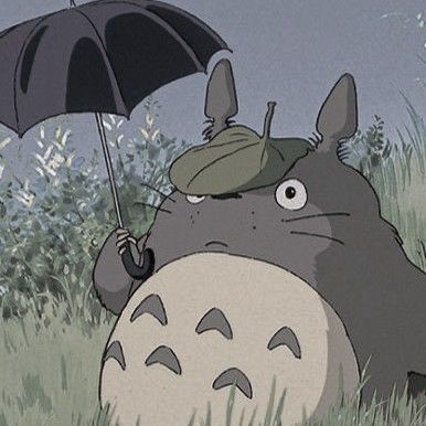 a cartoon character holding an umbrella in the grass