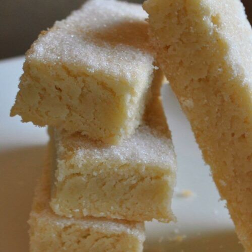 three pieces of cake sitting on top of a white plate