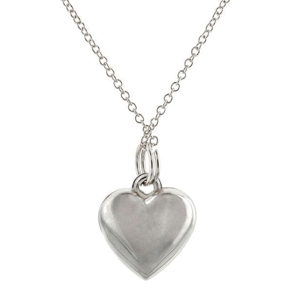 Designed as a heart which can be split in half to reveal a convex heart on one half and a concave heart on the other side that fit together to complete the whole. Designed to be shared with your favorite person. Available in 18k yellow gold or Sterling Silver. Each comes with two coordinating chains. White Gold Polished Heart Necklace, Classic White Gold Double Heart Necklace, White Gold Heart Necklace With Polished Finish, Heart Cut Locket Necklace For Anniversary, Classic Heart Pendant Necklace For Anniversary, White Gold Double Heart Necklace With Polished Finish, Classic Heart-shaped Jewelry With Polished Finish, White Gold Heart Pendant Necklace With Polished Finish, Valentine's Day White Gold Heart Necklace With Polished Finish