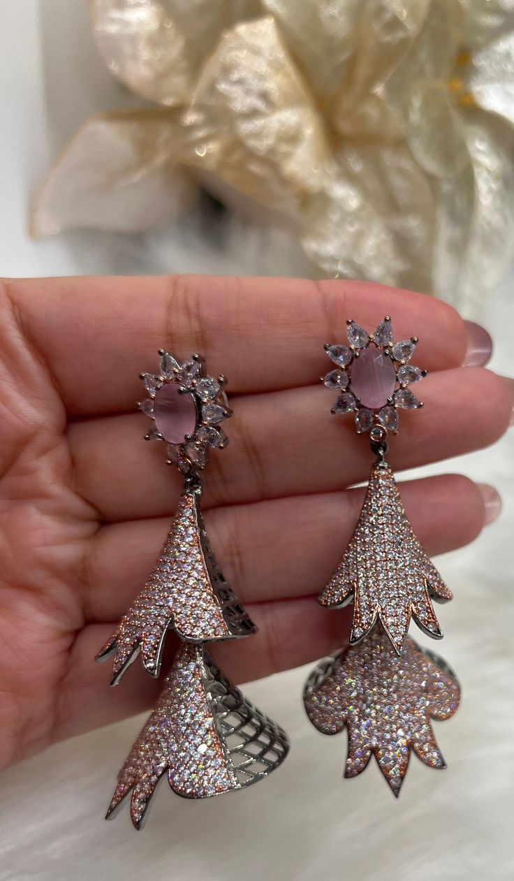 Beautiful American Diamond (AD) style Dangling Earring| Perfect for Wedding,Party wear | Indian, Pakistani,bridal jewelry.Mint ,Pink . Long Style AD Dangling Earrings. Material- American Diamond High End Quality 100% Satisfaction Guarantee: Long Lasting Plating, High-Quality Stones. Perfect for any occassion-Western, Indian and Casual day looks.    Colors Available- -Silver Pink - Silver Mint - RusticBlack Pink Care: It is advisable that you keep our products away from direct heat, humidity, and Rose Gold Cubic Zirconia Flower Earrings For Party, Pink Drop Flower Earrings For Formal Occasions, Elegant Pink Cubic Zirconia Flower Earrings, Pink Formal Flower Drop Earrings, Pink Teardrop Jewelry For Party, Pink Teardrop Earrings For Party, Pink Elegant Flower Earrings For Anniversary, Elegant Pink Teardrop Flower Earrings, Elegant Pink Flower Earrings