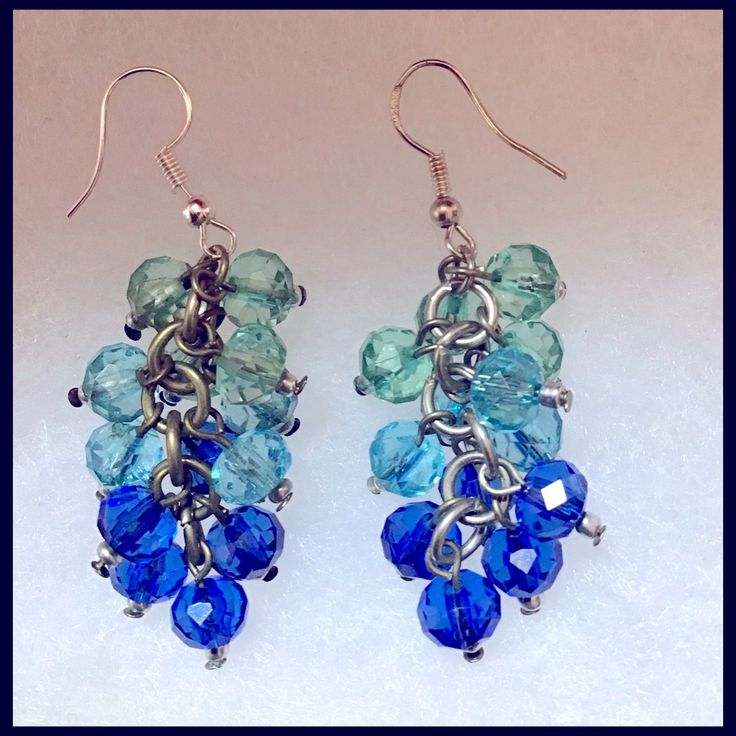 Here’s A Gorgeous Pair Of Handmade Blues Waterfall Earrings On Sterling Silver Earwires! You Can Make A Fashion Statement In Perfect Style! You’re Going To Get Lots Of Compliments! Makes An Excellent Gift For Yourself Or Your Loved Ones! Comes Already Gift Wrapped And In A Fancy Gold Gift Box! Comes From A Smoke And Pet Free Environment. Please Ask Any Questions You Have. Offers Welcome! Thank You For Shopping With Us At Nancy’s Creative Treasures! Blue Wire Wrapped Dangle Earrings, Blue Silver-plated Wire Earrings, Blue Silver Plated Wire Earrings, Blue Silver-plated Drop Earrings, Blue Wire Wrapped Dangle Jewelry, Waterfall Earrings, Science Jewelry, Silver Chain Earrings, Gold Gift Boxes