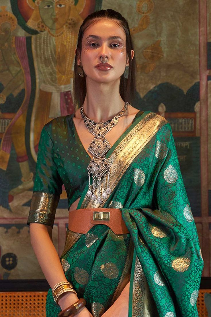 Product Features: Saree: Saree as seen in picture - Choose the drape style while order: Standard, Pleated or Gujarati Saree Color: Teal Green Saree Fabric : Art Silk Work : Tassels and Latkans Blouse: Please choose the selection "As seen in picture" or customize your selection Blouse Color: Teal green Blouse Fabric: Silk Blend Wash Care: Dry Clean Occasion: Wedding, Festive Product Type: Saree Disclaimer: There will be slight difference in digital to actual image All the accessories used by the Luxury Art Silk Saree With Peacock Design, Luxury Green Slub Silk Pre-draped Saree, Luxury Pista Green Tussar Silk Blouse Piece, Luxury Green Tussar Silk Blouse Piece, Elegant Pre-draped Saree With Tilla For Diwali, Elegant Floor-length Traditional Wear With Unstitched Blouse, Elegant Traditional Drape Choli For Diwali, Elegant Brocade Anarkali Set With Traditional Drape, Elegant Floor-length Blouse Piece For Navratri