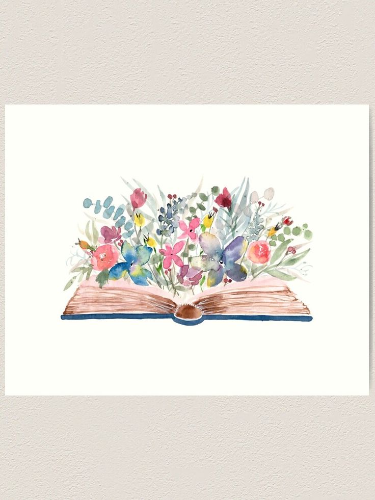 an open book with watercolor flowers on it